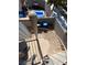 Spiral staircase with gray metal railing leads down to the backyard of the home at 7564 Durham Hall Ave # 201, Las Vegas, NV 89130