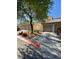 Charming townhouse featuring desert landscaping, mature shade trees and a private, attached garage at 7564 Durham Hall Ave # 201, Las Vegas, NV 89130