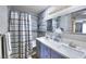 Well-lit bathroom showcasing a double sink vanity and shower/bath with modern fixtures at 759 Sunrise Crossing St, Henderson, NV 89014