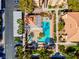 A bird's-eye view showcasing the community pool, jacuzzi, and surrounding buildings and greenery at 7950 W Flamingo Rd # 1003, Las Vegas, NV 89147