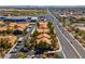 An aerial view of a vibrant neighborhood showcasing well-maintained buildings, lush greenery, and convenient street access at 7950 W Flamingo Rd # 1003, Las Vegas, NV 89147