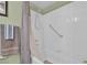 Bathroom featuring a shower-tub combination with modern fixtures at 7950 W Flamingo Rd # 1003, Las Vegas, NV 89147