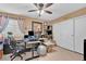 Functional bedroom with a ceiling fan, closet, and a dedicated workspace, offering versatility at 7950 W Flamingo Rd # 1003, Las Vegas, NV 89147