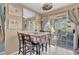 Charming dining area with sliding door access to the outdoor patio at 7950 W Flamingo Rd # 1003, Las Vegas, NV 89147