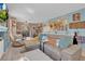 Cozy living room with plush seating, bright natural light, and an open layout at 7950 W Flamingo Rd # 1003, Las Vegas, NV 89147
