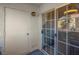 Private patio with sliding glass doors, storage closet and outdoor lighting at 7950 W Flamingo Rd # 1003, Las Vegas, NV 89147