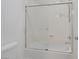 A white bathtub with a glass door, shower head, and soap dish at 8209 Chapelle Ct, Las Vegas, NV 89131