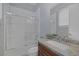 Bathroom with tub-shower combo, granite counters, and modern fixtures at 8209 Chapelle Ct, Las Vegas, NV 89131