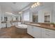 Spacious bathroom with dual sinks, a large soaking tub and a separate glass enclosed shower at 8209 Chapelle Ct, Las Vegas, NV 89131