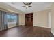 Bedroom with hardwood flooring, recessed lighting, a window view, and built-in shelving at 8209 Chapelle Ct, Las Vegas, NV 89131