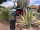 Dog waste station with bag dispenser and disposal can in a common area at 8209 Chapelle Ct, Las Vegas, NV 89131