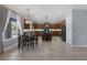 Spacious kitchen with tile flooring, wooden cabinetry, and a center island at 8209 Chapelle Ct, Las Vegas, NV 89131