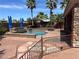 Backyard pool and spa surrounded by lush landscaping, offering a tranquil oasis for relaxation at 8209 Chapelle Ct, Las Vegas, NV 89131
