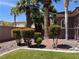 Beautiful side yard featuring decorative shrubs, and stone ground cover at 8209 Chapelle Ct, Las Vegas, NV 89131