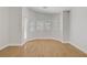 Bright bedroom features laminate flooring and generous natural light at 830 Binbrook Dr, Henderson, NV 89052