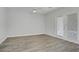 Spacious bedroom featuring neutral paint, fan, and patio access at 830 Binbrook Dr, Henderson, NV 89052