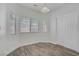 Dining area with neutral paint, wood floors, and natural light at 830 Binbrook Dr, Henderson, NV 89052