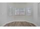 Bright dining area with natural light and wood flooring at 830 Binbrook Dr, Henderson, NV 89052