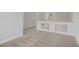 Hallway boasts neutral carpet, modern white accents, and seamless flow at 830 Binbrook Dr, Henderson, NV 89052