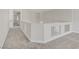 Hallway boasts neutral carpet, modern white accents, and seamless flow at 830 Binbrook Dr, Henderson, NV 89052