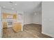 Open kitchen with bright lighting and wood floors at 830 Binbrook Dr, Henderson, NV 89052