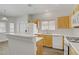 Bright kitchen with stainless steel appliances and ample storage space at 830 Binbrook Dr, Henderson, NV 89052