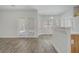 Bright living room with wood floors and access to the outdoor patio at 830 Binbrook Dr, Henderson, NV 89052