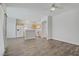 Spacious living room offering an open floorplan with wood flooring at 830 Binbrook Dr, Henderson, NV 89052