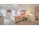 Bright bedroom with carpet, white walls, and matching furniture offers a calm, relaxing space at 8454 Mondavi Hill Ct, Las Vegas, NV 89139