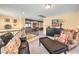 A cozy upstairs living room with plush seating and an open view of the lower level at 8454 Mondavi Hill Ct, Las Vegas, NV 89139