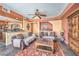 Open living area with a view of the kitchen and dining area, featuring stylish furniture and decor at 8454 Mondavi Hill Ct, Las Vegas, NV 89139