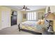 A primary bedroom featuring neutral paint, plantation shutters and a large walk in closet for storage at 8454 Mondavi Hill Ct, Las Vegas, NV 89139