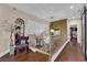 Hallway with hardwood floors, stylish decor, and elegant lighting at 8824 Prague Ct, Las Vegas, NV 89147