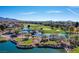 An aerial view highlights the golf course and ponds, blending luxury living with natural beauty at 9 Contra Costa Pl, Henderson, NV 89052