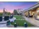 Backyard featuring patio seating and lush green artificial grass at 9 Contra Costa Pl, Henderson, NV 89052