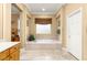 Elegant bathroom with a soaking tub, ample vanity space, and tasteful decor creating a serene and inviting space at 9 Contra Costa Pl, Henderson, NV 89052