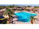 A resort-style pool with mature palms offers a refreshing oasis for relaxation and recreation at 9 Contra Costa Pl, Henderson, NV 89052