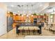 Gourmet kitchen featuring a large island with seating and modern stainless steel appliances at 9 Contra Costa Pl, Henderson, NV 89052