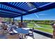 Outdoor patio seating with golf course views, perfect for dining and relaxing al fresco at 9 Contra Costa Pl, Henderson, NV 89052