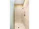 Modern shower featuring sleek fixtures and neutral tiling, providing a clean and contemporary bathing experience at 9 Contra Costa Pl, Henderson, NV 89052