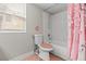 Pretty bathroom features a tub with shower and a toilet at 9416 Rolling Ridge Ln, Las Vegas, NV 89134