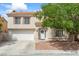 Charming two-story home with a well-maintained front yard and a two-car garage at 9416 Rolling Ridge Ln, Las Vegas, NV 89134