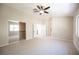Large carpeted bedroom with closet and views to the loft area at 9750 W Cherokee Ave, Las Vegas, NV 89147