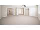 Bright bedroom with carpet and doors to the bathroom and closet at 9750 W Cherokee Ave, Las Vegas, NV 89147