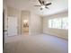 Inviting carpeted bedroom with ensuite bath at 9750 W Cherokee Ave, Las Vegas, NV 89147