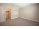Neutral bedroom with closet space featuring plush carpeting and natural light at 9750 W Cherokee Ave, Las Vegas, NV 89147