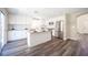 Bright kitchen with white cabinets, stainless steel appliances, an island, and modern finishes at 9750 W Cherokee Ave, Las Vegas, NV 89147