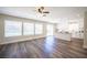 Bright living room with windows providing natural light and view into the kitchen at 9750 W Cherokee Ave, Las Vegas, NV 89147