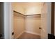 Small, neutral colored walk-in closet with carpet and shelving at 9750 W Cherokee Ave, Las Vegas, NV 89147