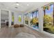Inviting bonus room with large windows offering great views of the swimming pool at 134 Wentworth Dr, Henderson, NV 89074